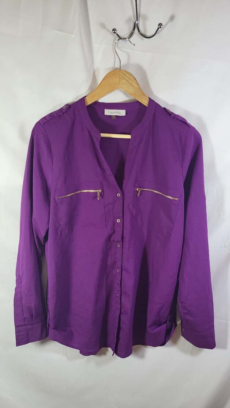 Calvin Klein Women's Purple V-Neck Blouse with Gold Zipper Pockets and Button-Up